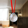 Faceted clear crystal hanging ball on red ribbon with reflective facets