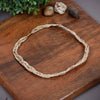Braided cream necklace with looped braided cord