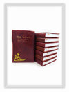 Maroon diary with decorated cover; matching stacked diaries beside it