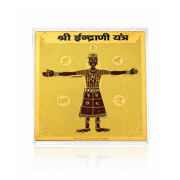 Gold-toned yantra card with four-armed deity and ornamental details