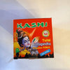 Kashi Ashtagandha Chandan Tika powder box, orange front with deity artwork