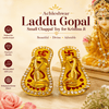 Gold miniature chappal toy slippers with red panels and rhinestone trim, pair