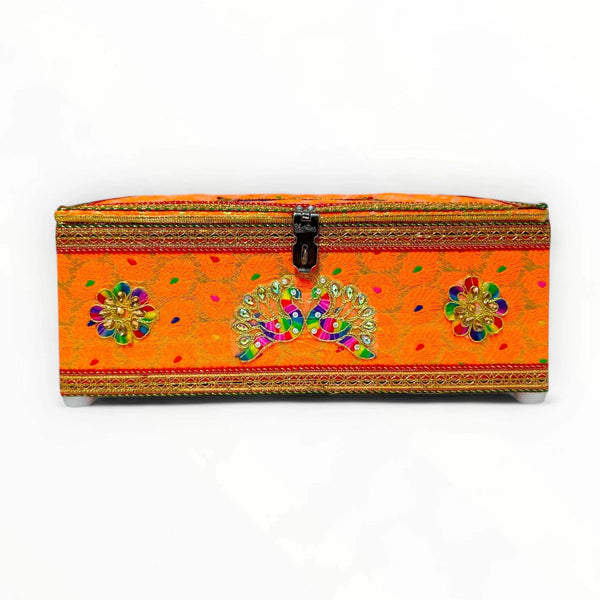 Long decorative velvet storage box in orange with floral appliques and gold trim