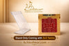 Clear acrylic yantra stand holding a red diagram card