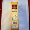 Dhoop incense sticks box, brown label with floral patterns and brand emblem