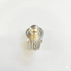 Metallic Shivling figure with rounded top and circular base, silvery-gold finish