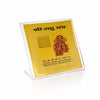 Gold Rahu yantra card in a clear acrylic stand, front view.