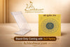 Gold-plated Kuber yantra on clear stand with matching gold backing card