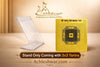 Gold yantra card displayed on a clear stand with small black geometric mandala