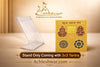 Transparent acrylic stand holding a gold yantra chart with deity and geometric symbols