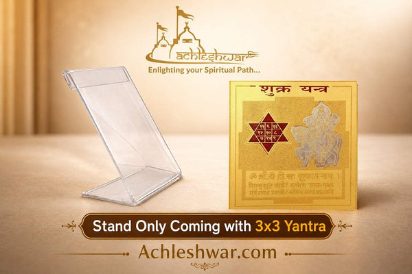 Clear acrylic yantra stand holding a gold card with red star and deity illustration.