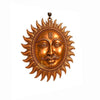 Copper wall hanging sun face sculpture with detailed eyes and halo rays