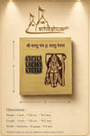 Gold-toned yantra plate with maroon deity and blue grid symbols, shown with size arrows