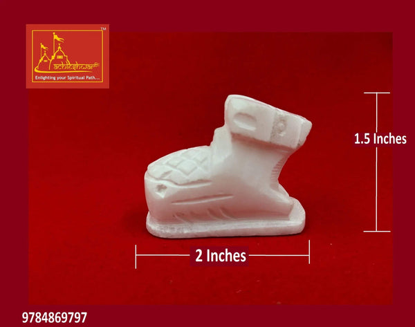 White marble Nandi figurine, seated with carved texture